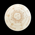 Decorative coin with sun design and text on a beige background