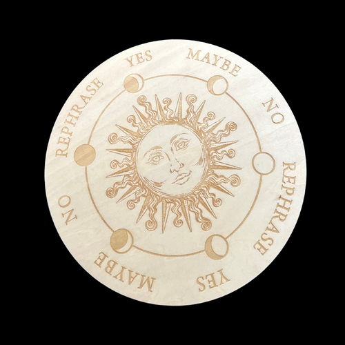 Decorative coin with sun design and text on a beige background