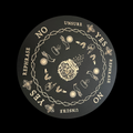 Decorative circular design with yes/no options and symbolic elements on a black background