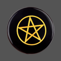 A round black obsidian stone rune featuring a pentagram symbol in the center, shown against a solid dark gray background.