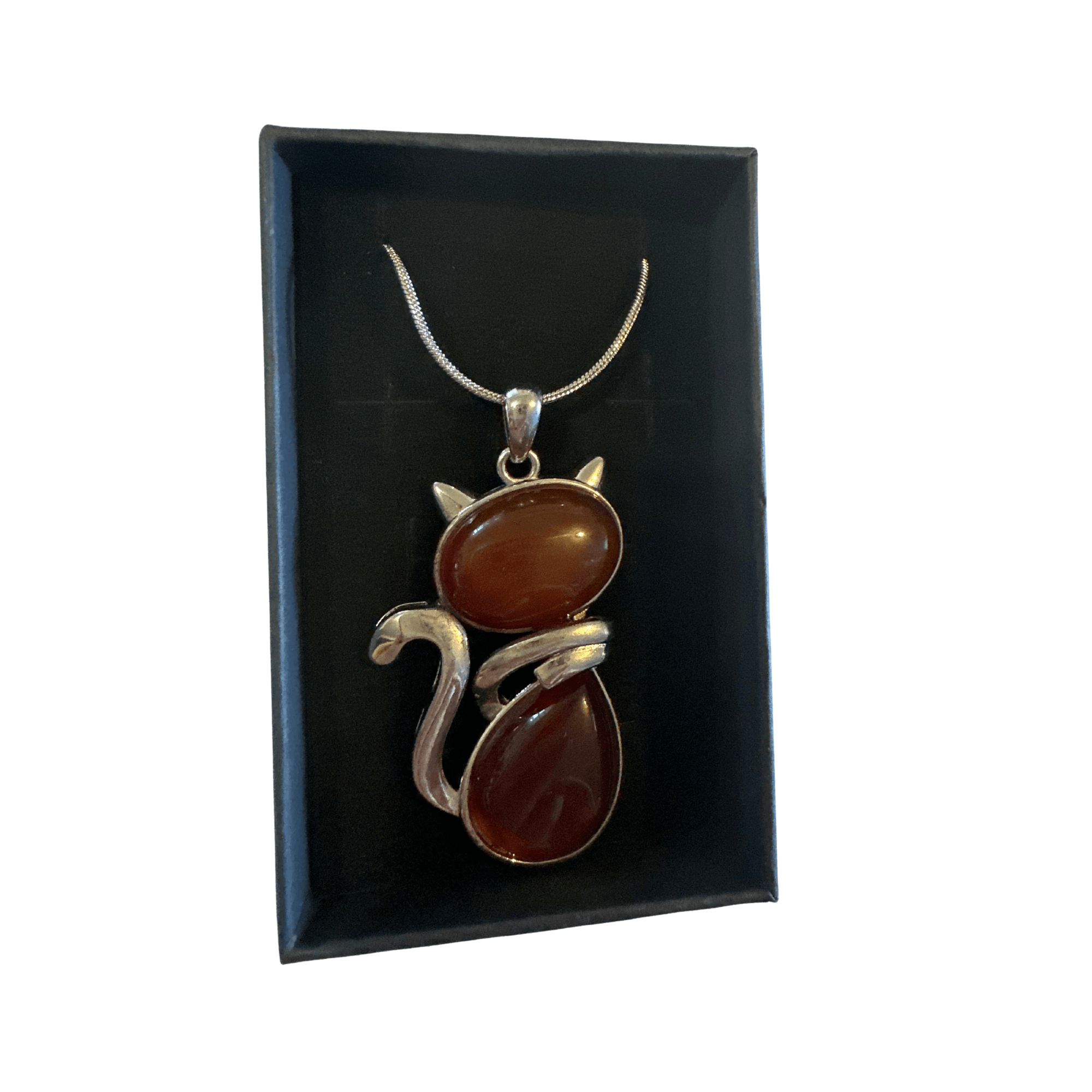 Carnelian Cat Pendant on a silver chain displayed in a black jewelry box.