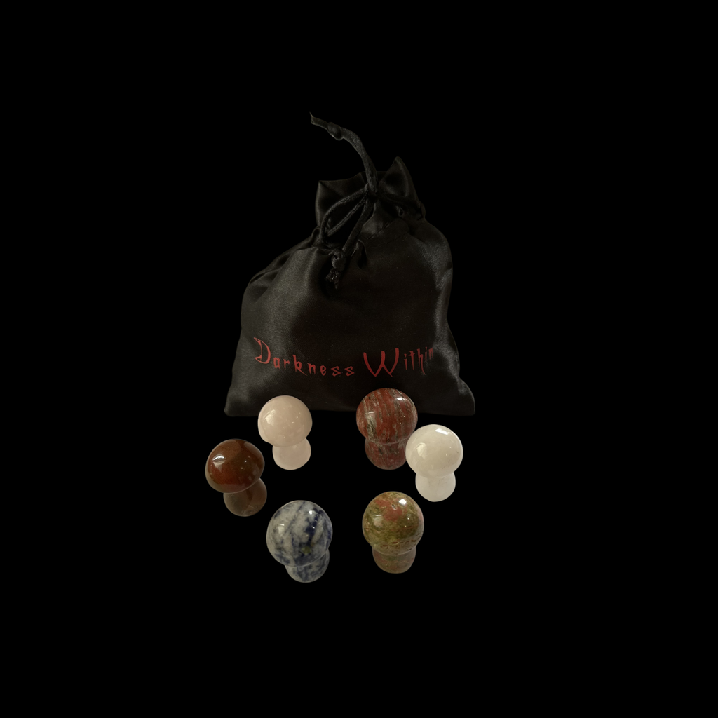 Set of assorted crystal mushrooms with a black drawstring bag labeled 'Darkness Will' on a black background.