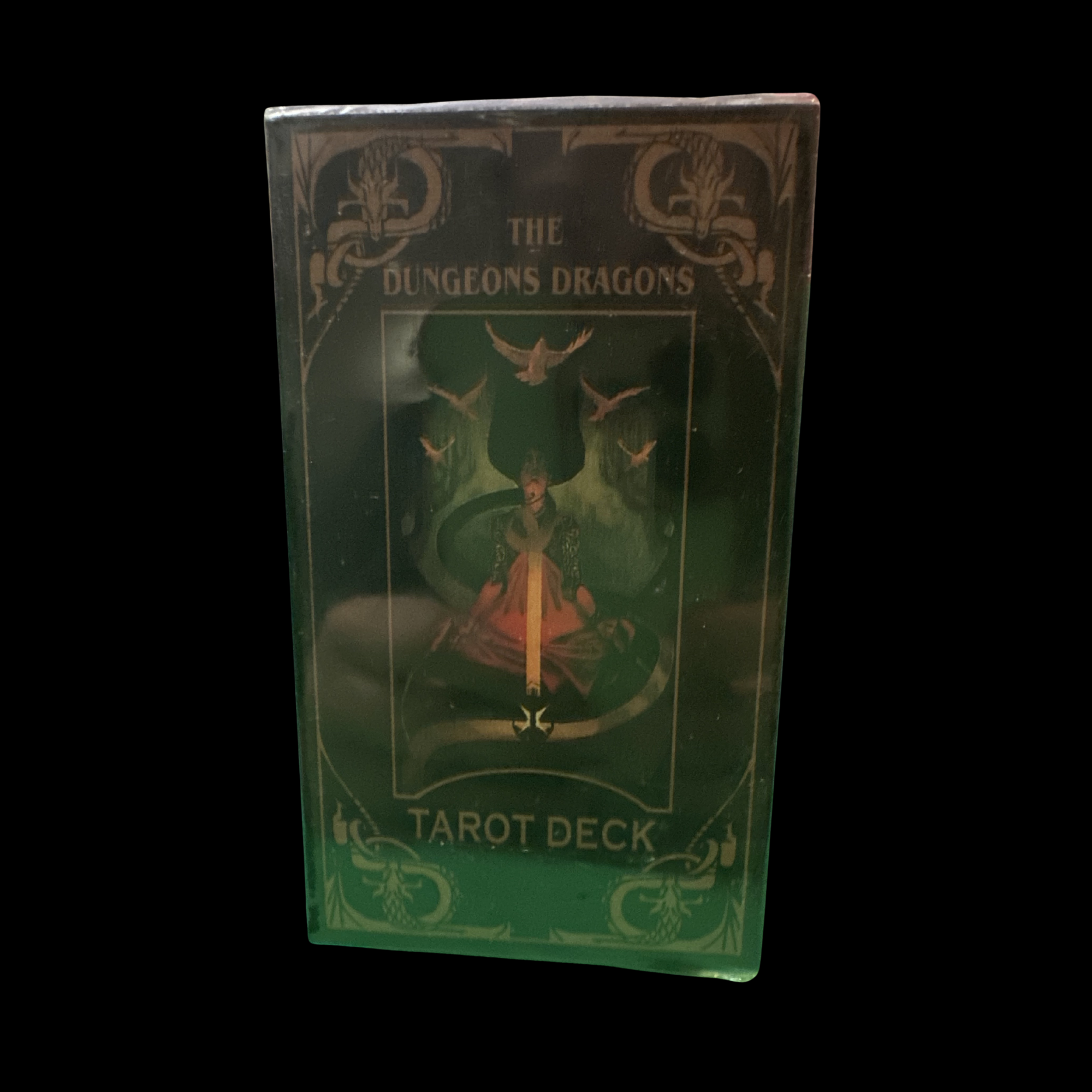 Tarot deck packaging with 'The Dungeons & Dragons' branding on a black background