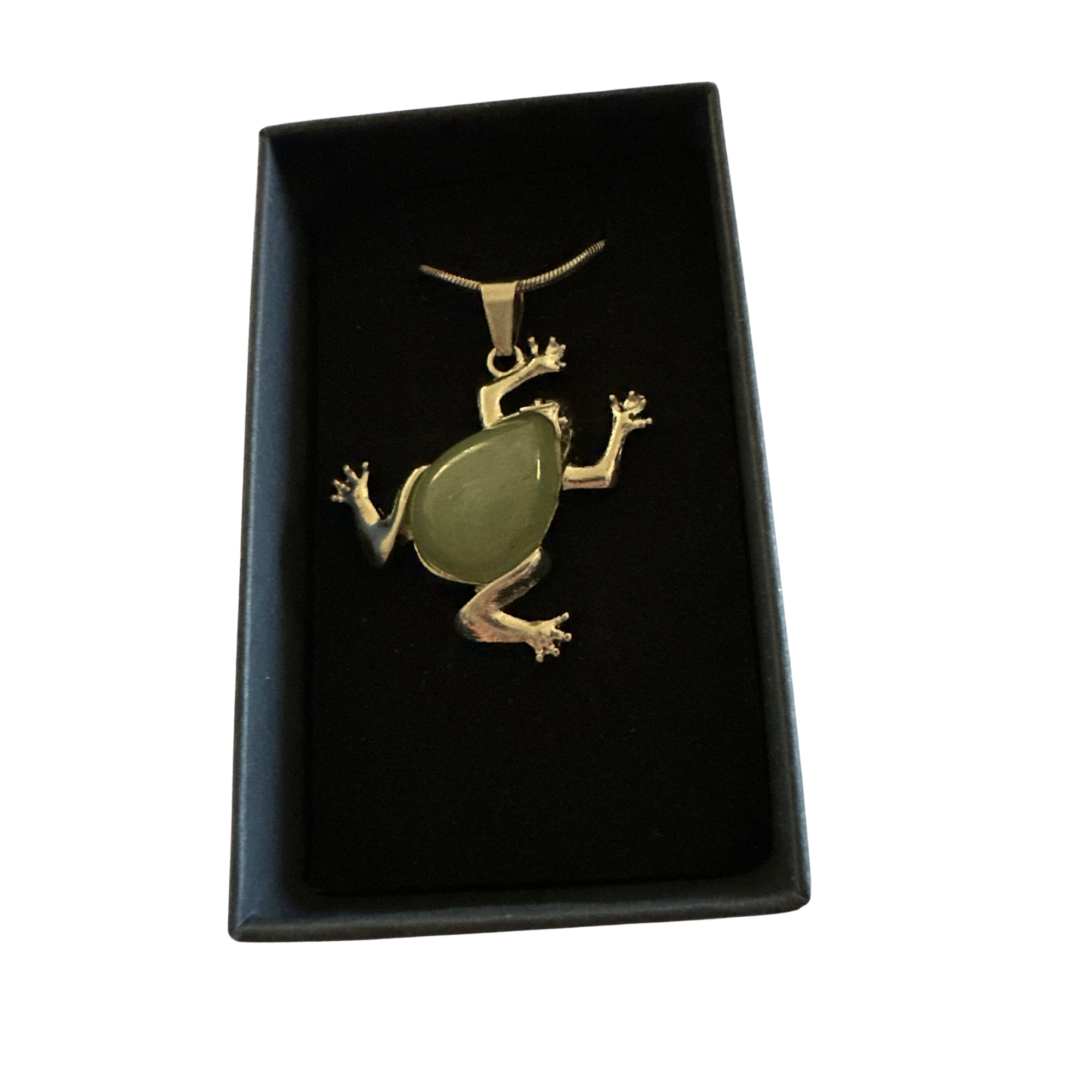 Green aventurine frog pendant on a silver chain in a black display box.