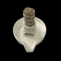 Ceramic sage or palo santo stick holder with a bundle of sticks tied with twine on a speckled white base