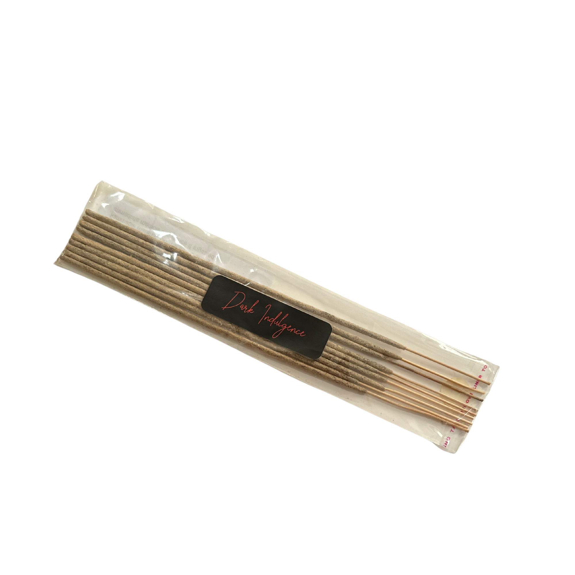 White Sage Incense Sticks by Dark Indulgence in clear plastic packaging with brown sticks.
