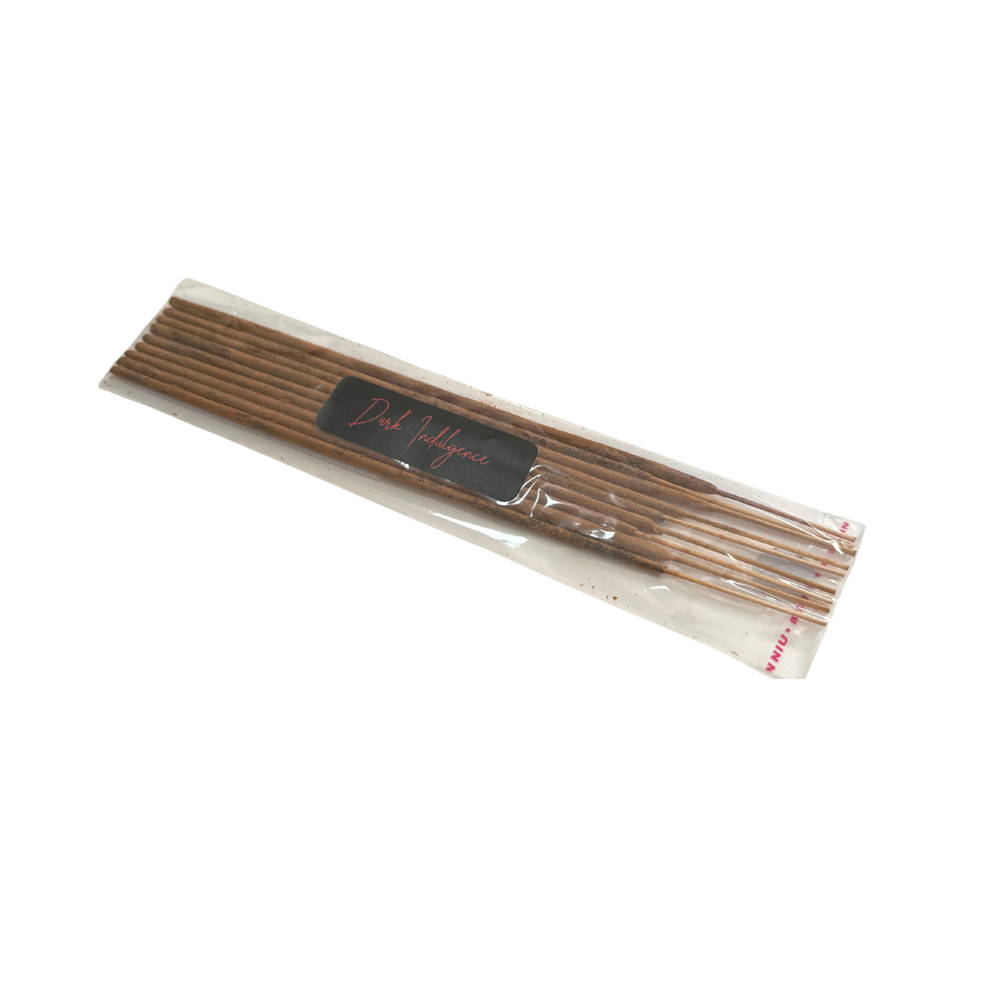 Sandalwood incense sticks in a clear package with brown sticks and a black label reading Dark Indulgence.