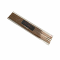 Cinnamon incense sticks in clear plastic packaging with Dark Indulgence label.