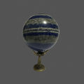 Decorative sphere with blue and gray striped pattern on a claw shape stand against a gray background