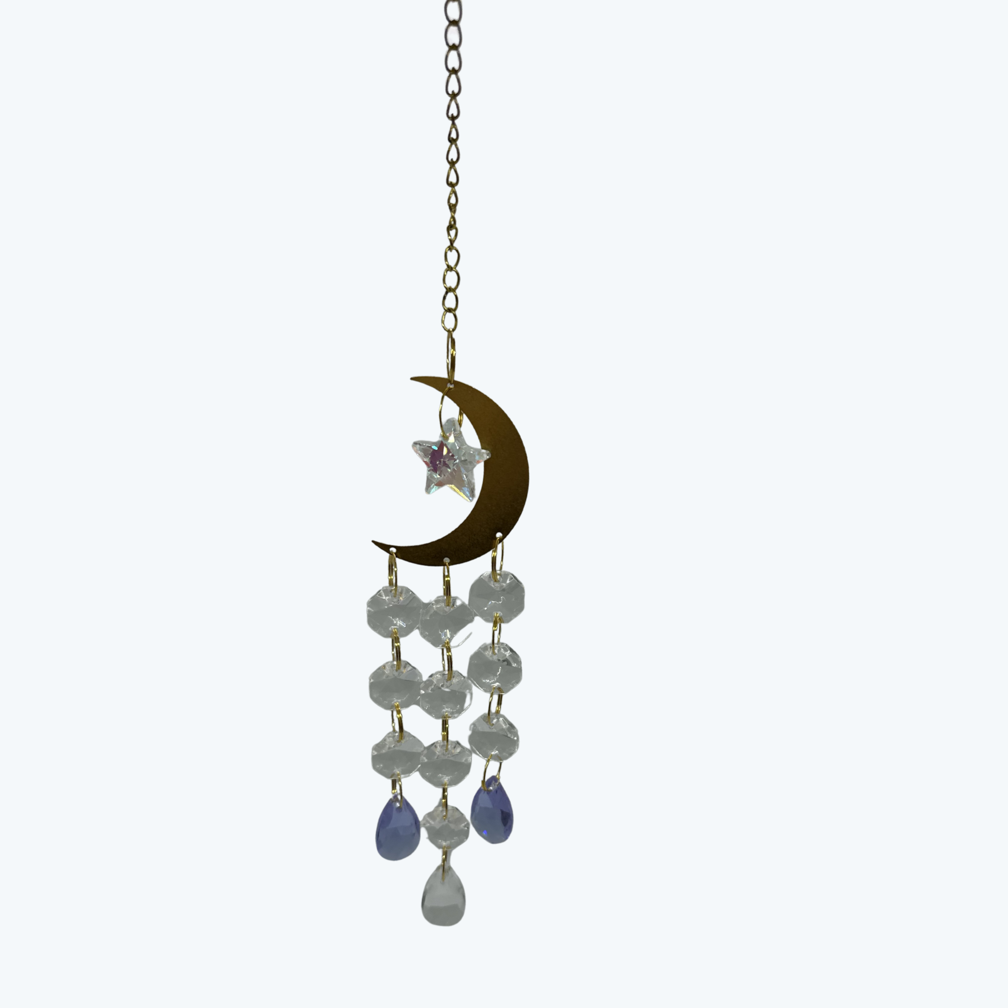 Chain with a moon with 3 lines of clear octagon crystal and a teardrop crystal hanging from the moon